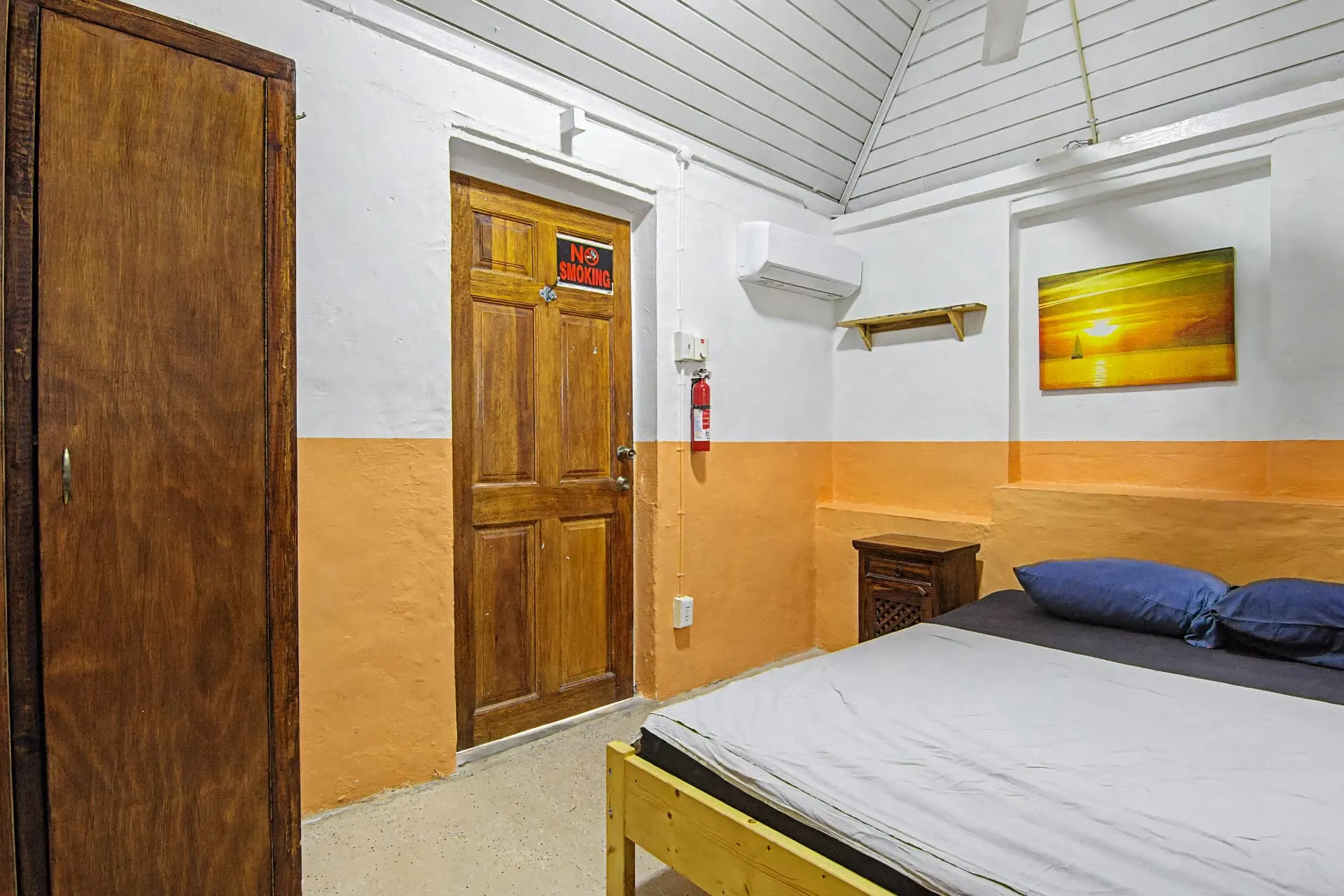 Casa 2 private studio bedroom with double bed, wardrobe and air conditioning