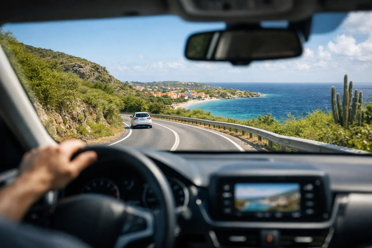 Driving along the Curaçao coast on the way to student housing